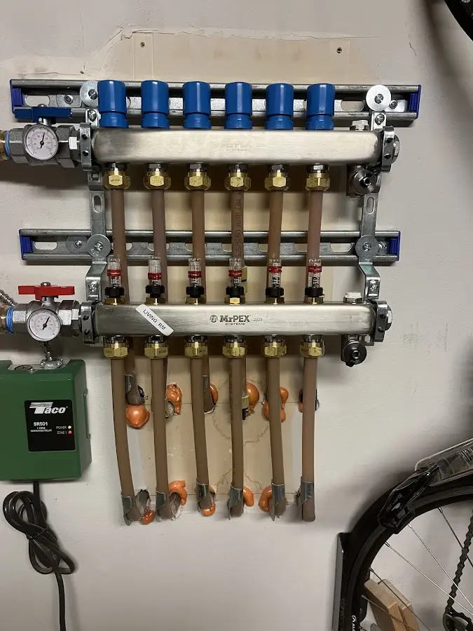 Plumber performing Gas Leak Detection at a residential property in Wrentham